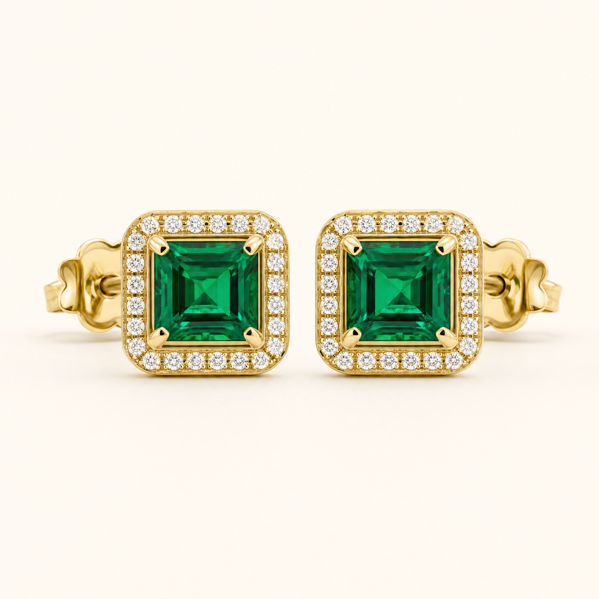 Adele Gold Emerald Earrings - studio shot